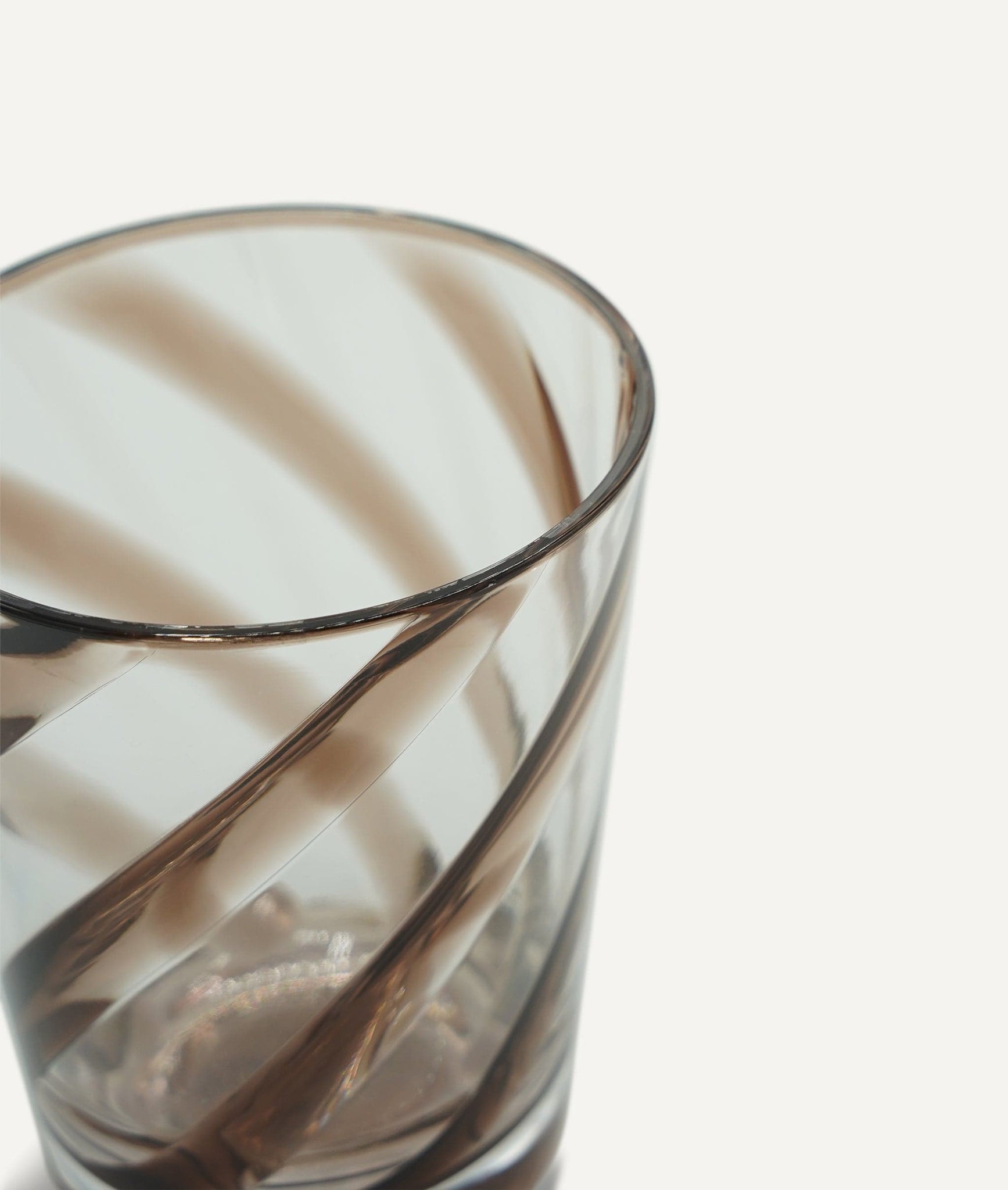 Glass - transparent with brown spiral decoration in methacrylate